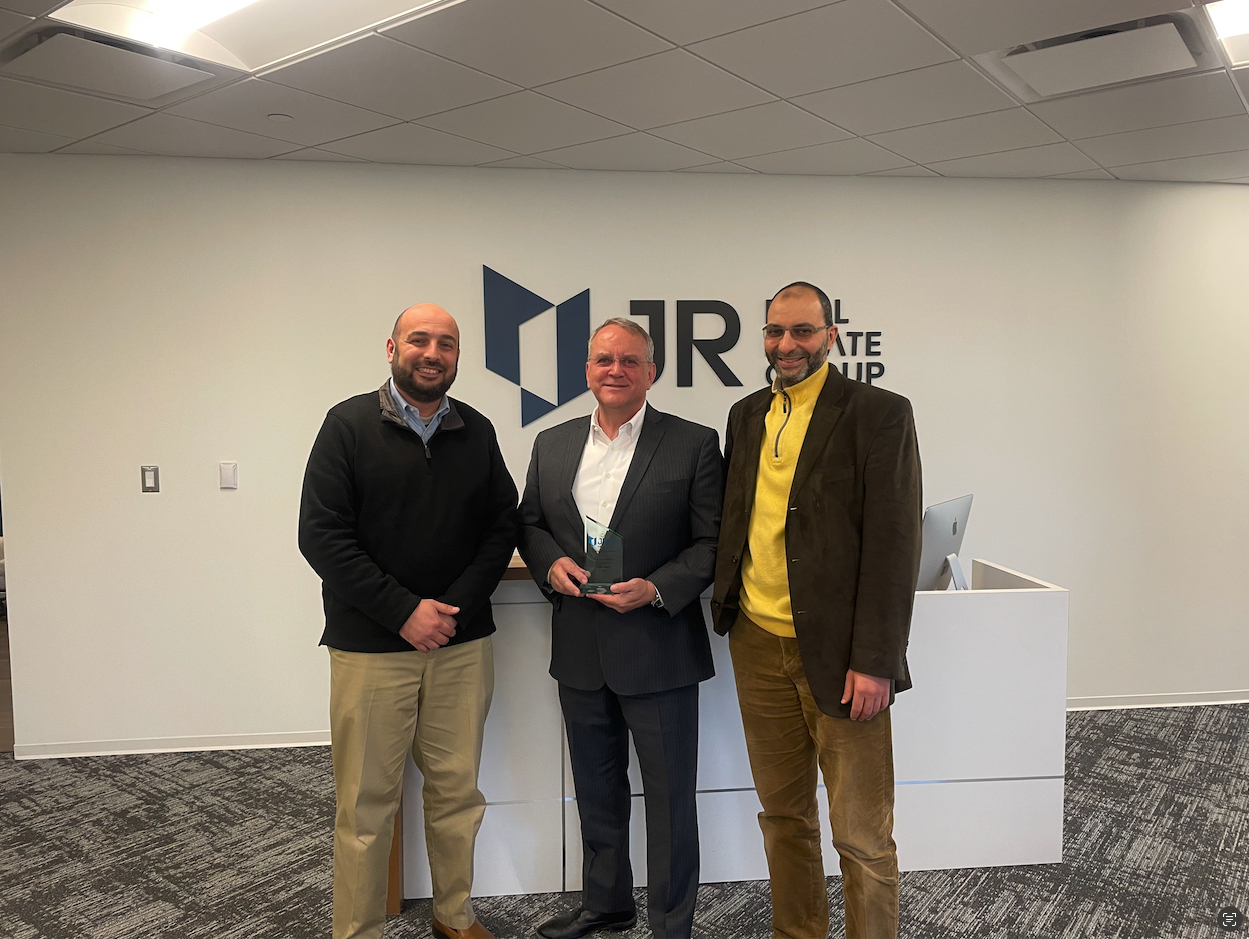 Sherman Patrick Receives 2022 Appreciation Plaque from JR Real Estate Group